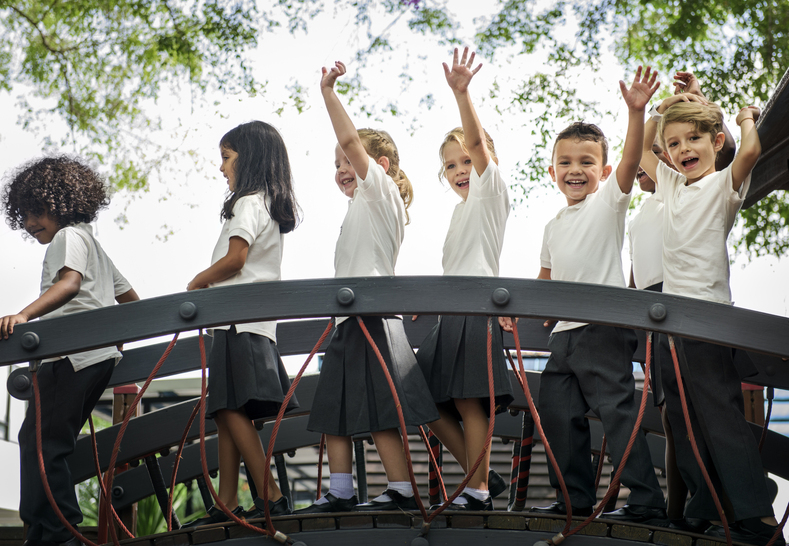 Happy kids have fun together in the canteen of the elementary school Stock  Photo - Alamy