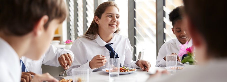 High-school-students-wearing-uniform-in-cafeteria